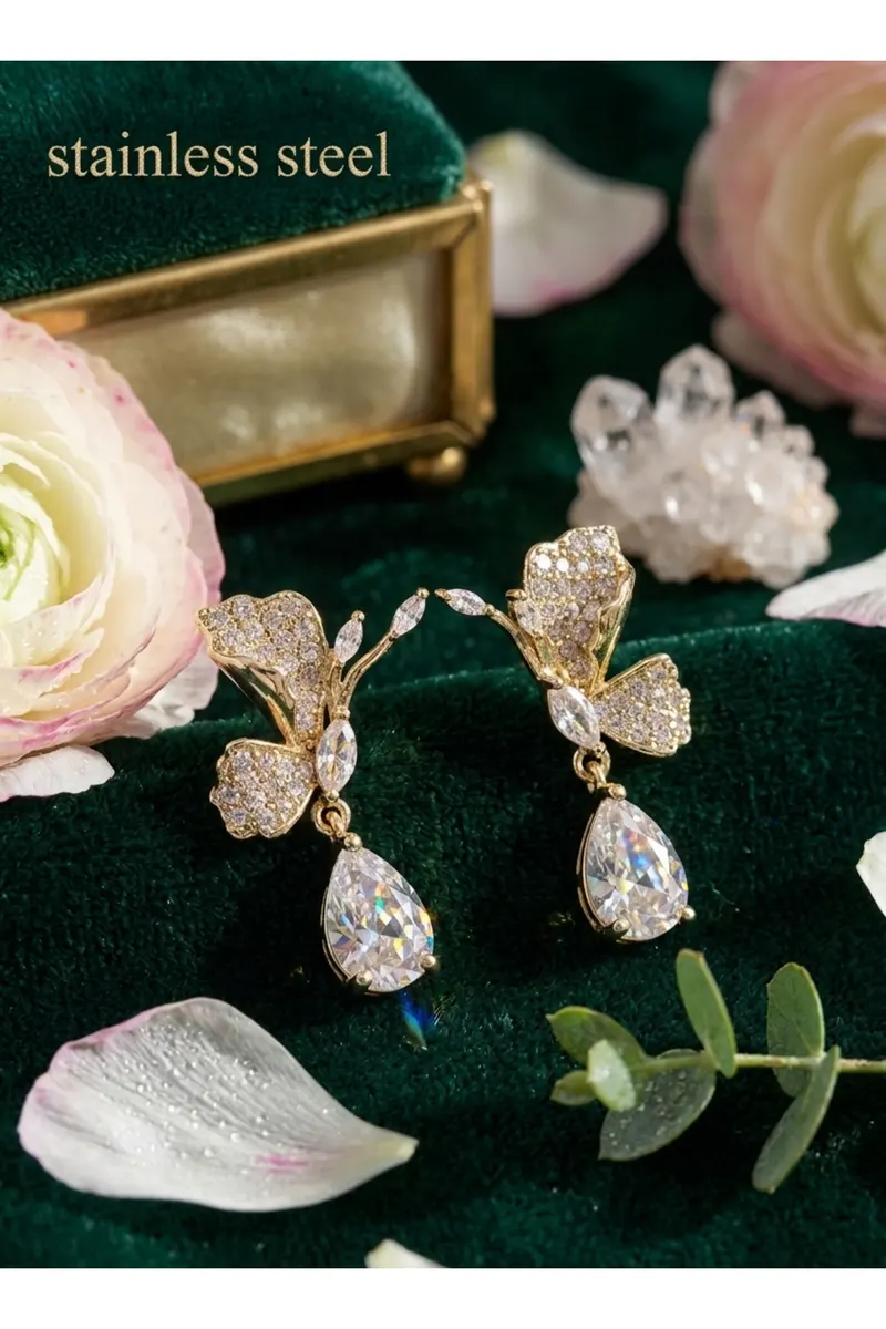 Pirinç Gold Renk Zirkon Taşlı Turna Kuşu Model Sallantılı Küpe