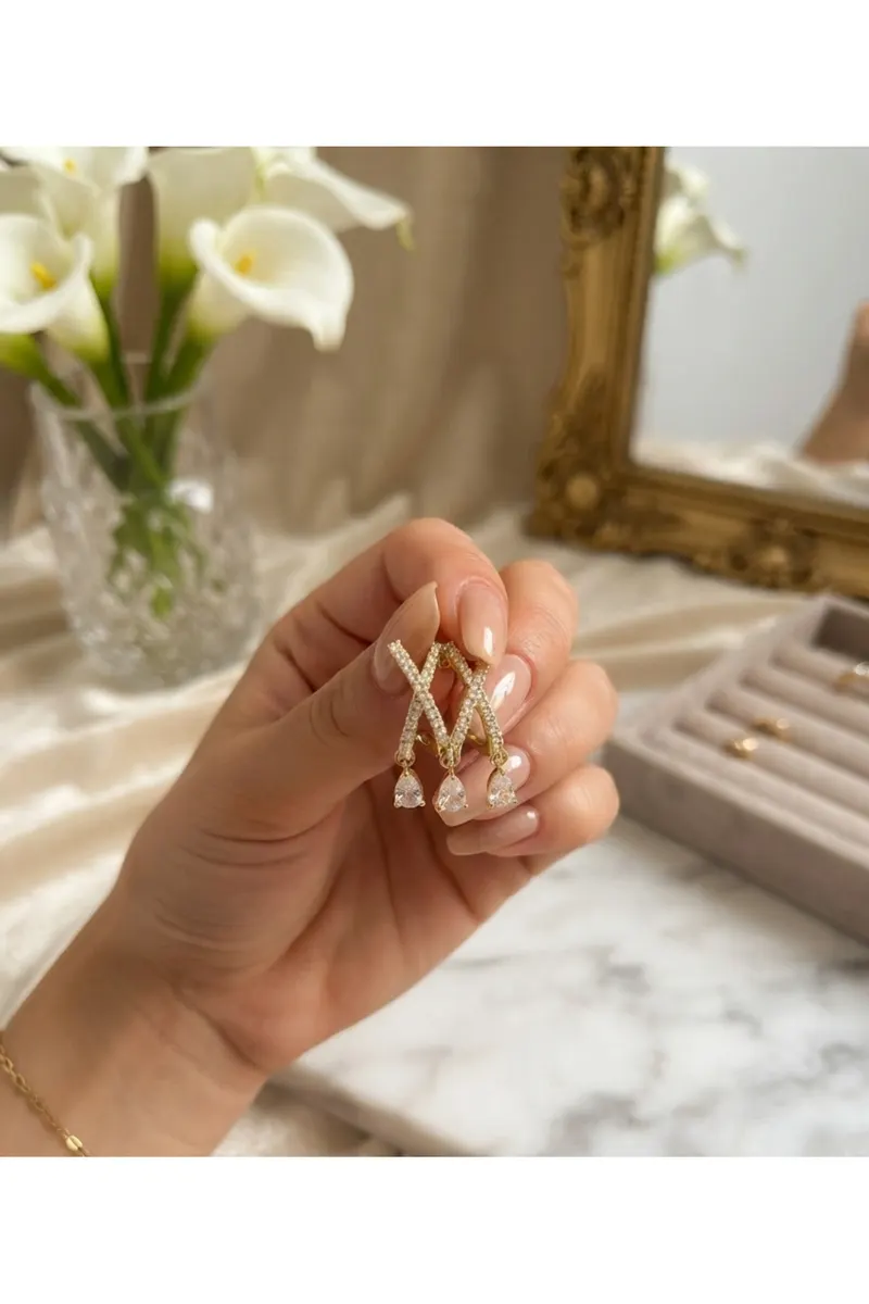 Pirinç Gold Renk Zirkon Taşlı X Model Sallantı Detay Küpe