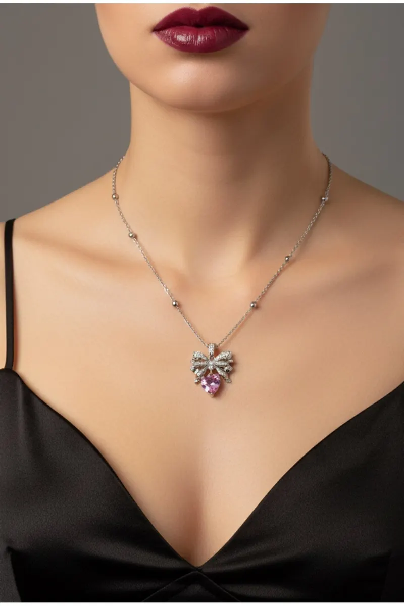 Gümüş Renk Pembe Kalp Fiyonk Model Çelik Kolye