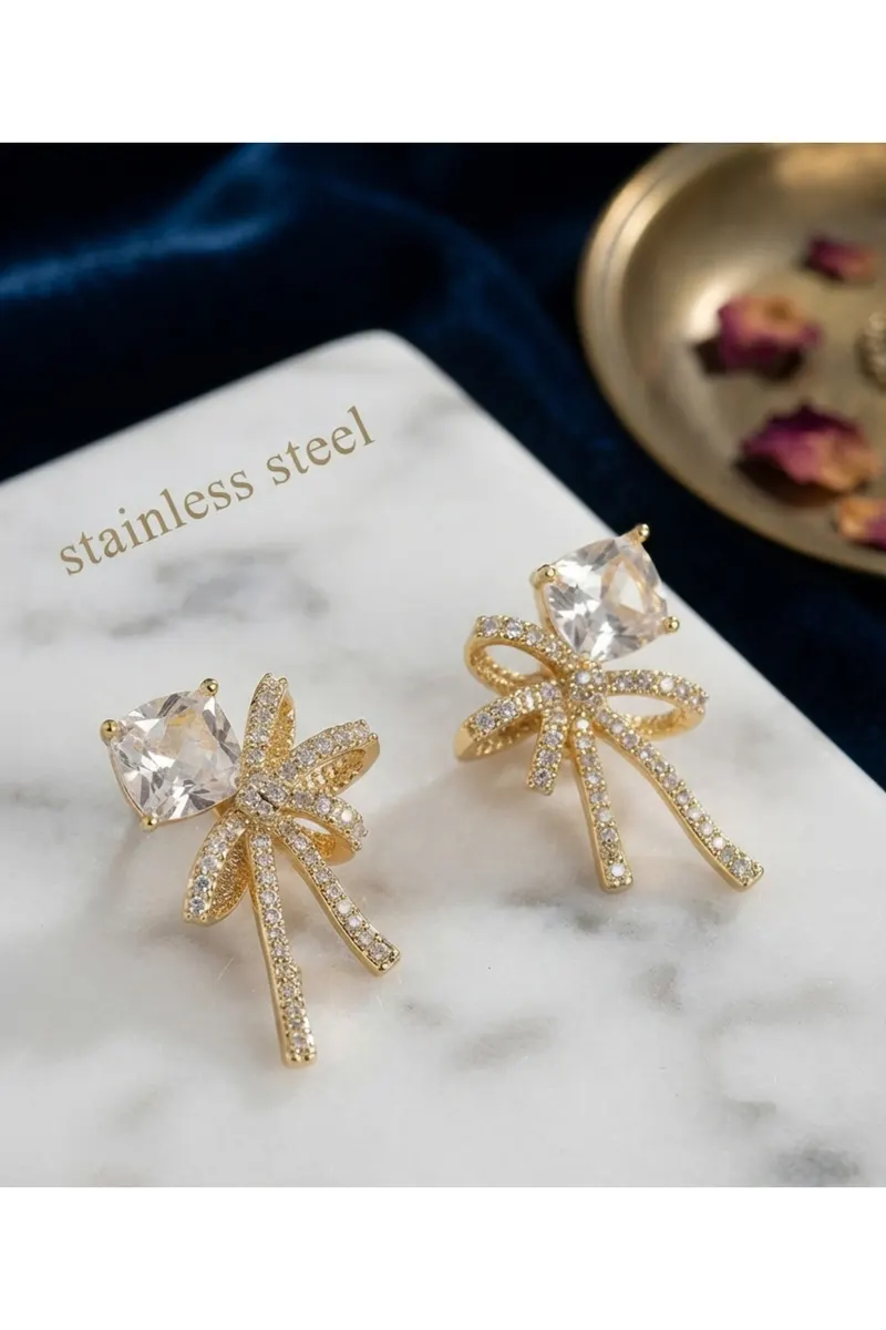 Pirinç Gold Renk Zirkon Taşlı Kurdele Model Küpe