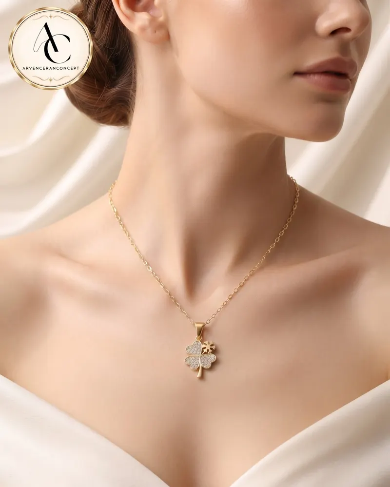 gold renk kar taneli yonca model çelik kolye