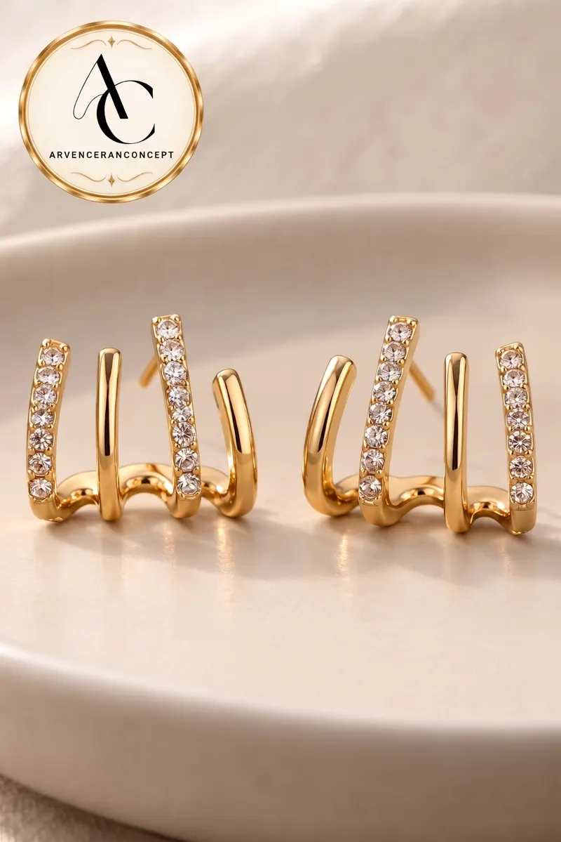 gold renk zirkon taş detaylı tırnak küpe
